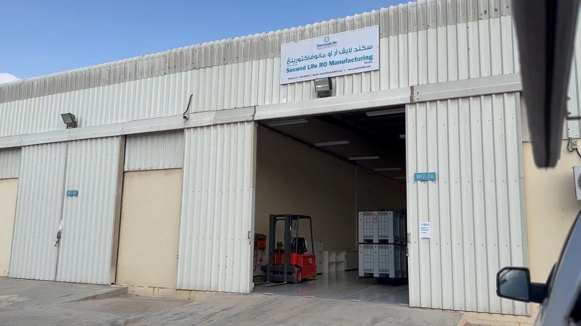 The entrance of the Second Life RO Manufacturing plant, collection boxes inside